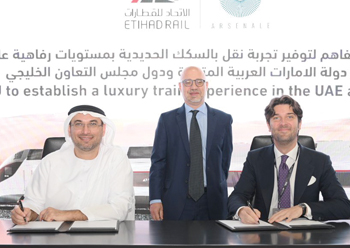 Officials of Etihad Rail and Italian company Arsenale sign the key agreement.