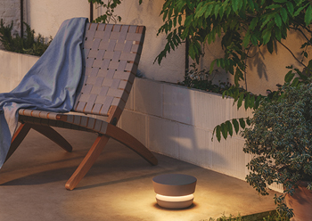 Dots Outdoor nestles discreetly on a patio and emits a pleasant low-level glow.
